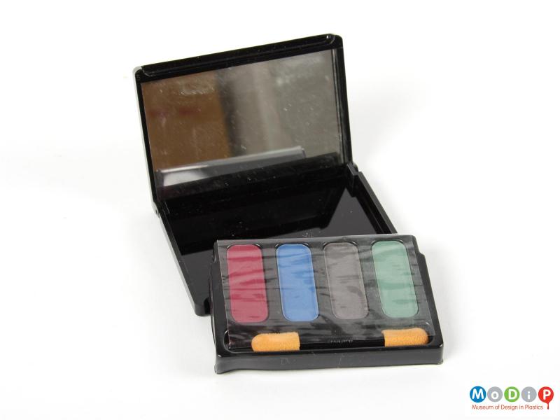 Open view of a Biba tint set showing the inside of the box exposing the tints, applicator and mirror.