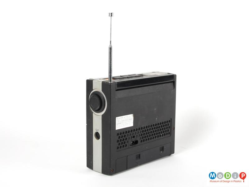Rear view of an ITT Pinto radio showing the handle folded down and the aerial lifted.