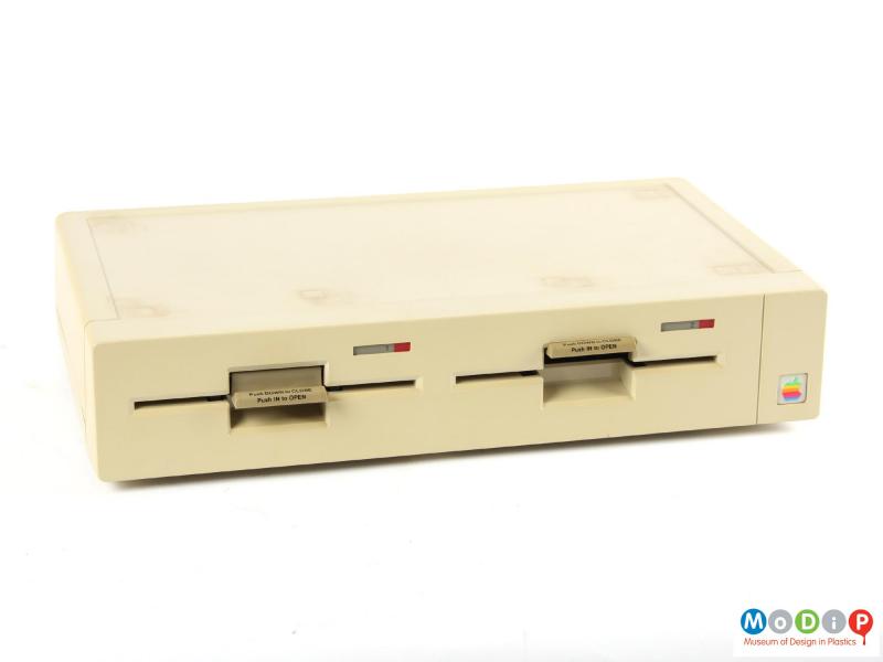 Front view of an Apple IIe showing the disk drive on its own.
