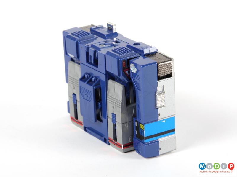Side view of a Tranformers Soundwave showing the belt clip on the back.