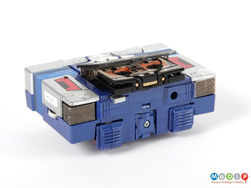 Top view of a Tranformers Soundwave showing the cassette panel open and the cassette exposed.