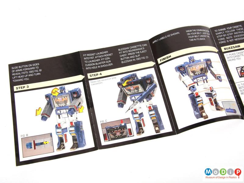 Close view of a Tranformers Soundwave showing the insdie of one of the booklets.