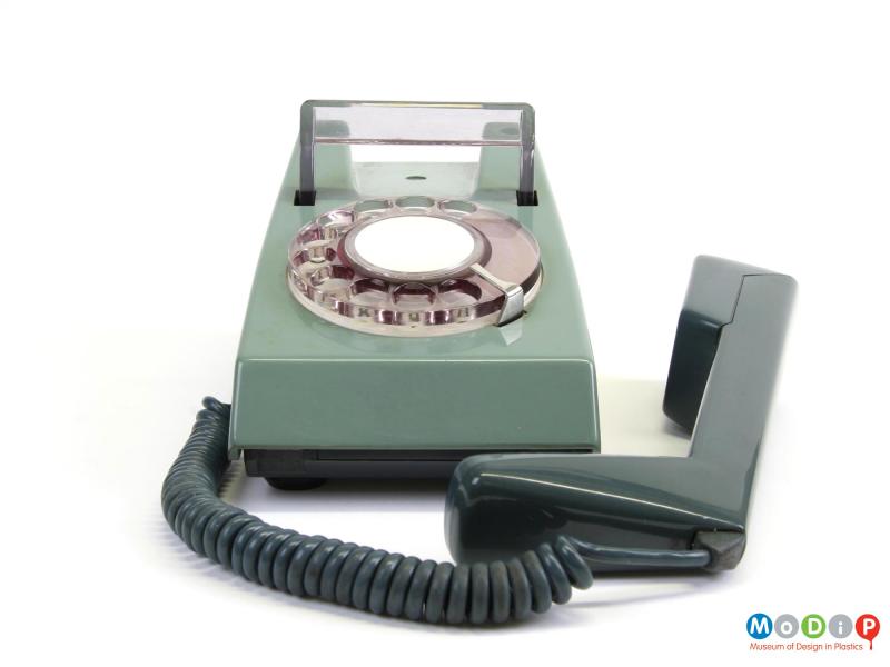 Front view of a telephone showing the dial.