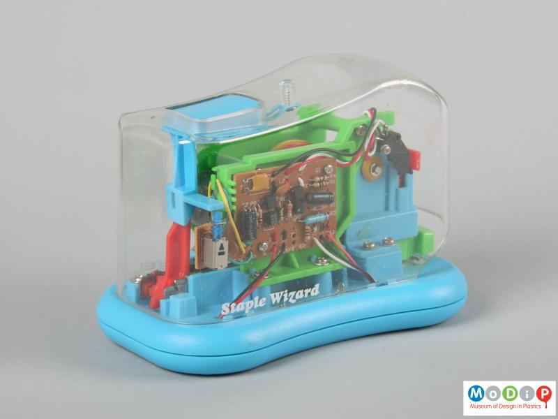 Side view of a Staple Wizard showing the circuit board and wiring.