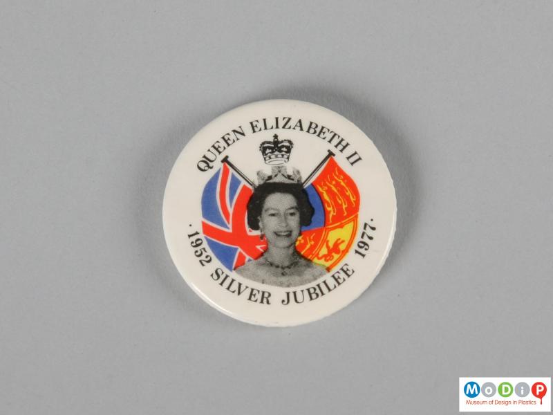 Front view of a pin badge showing the printed design.