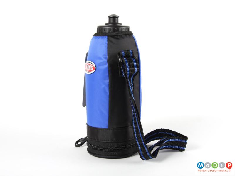 Side view of a Thermos insulated bottle showing the shoulder strap.