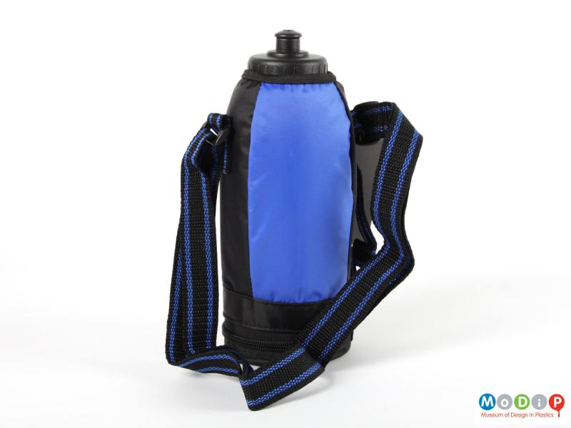 Rear view of a Thermos insulated bottle showing the plain back and the shoulder strap.