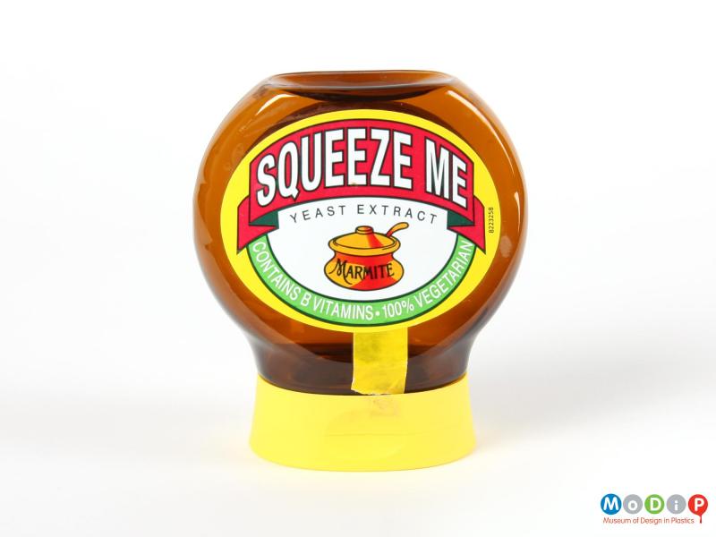 Front view of a Marmite jar showing the round body and flat lid.