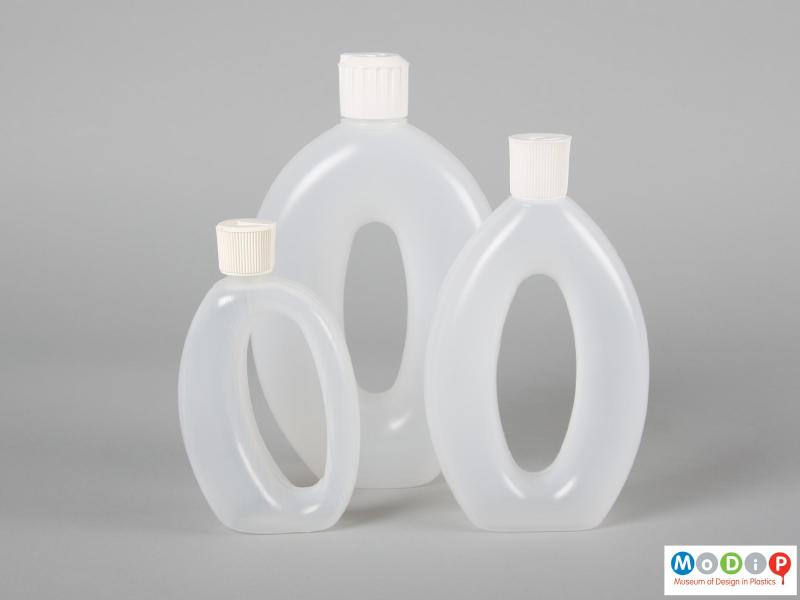 Side view of Runaid bottle showing three sizes of the bottle.