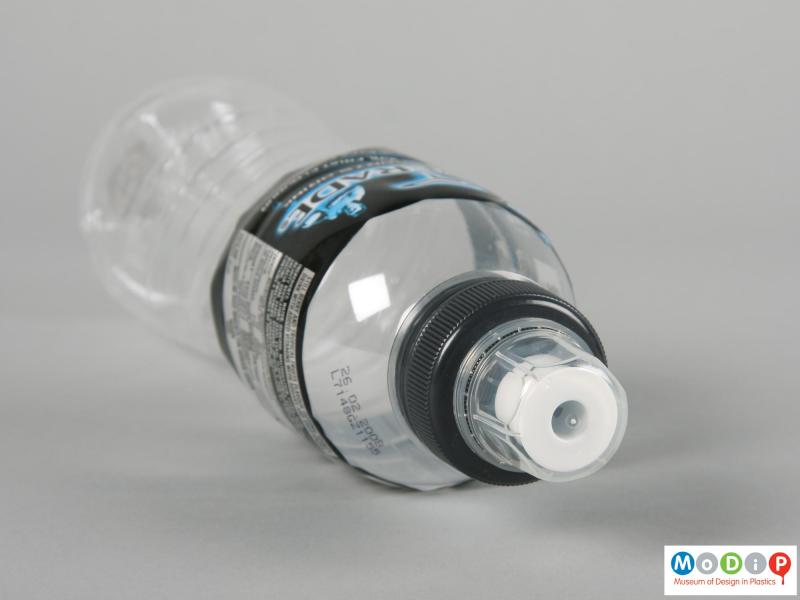 Top view of a Powerade bottle showing the dust cap in place.
