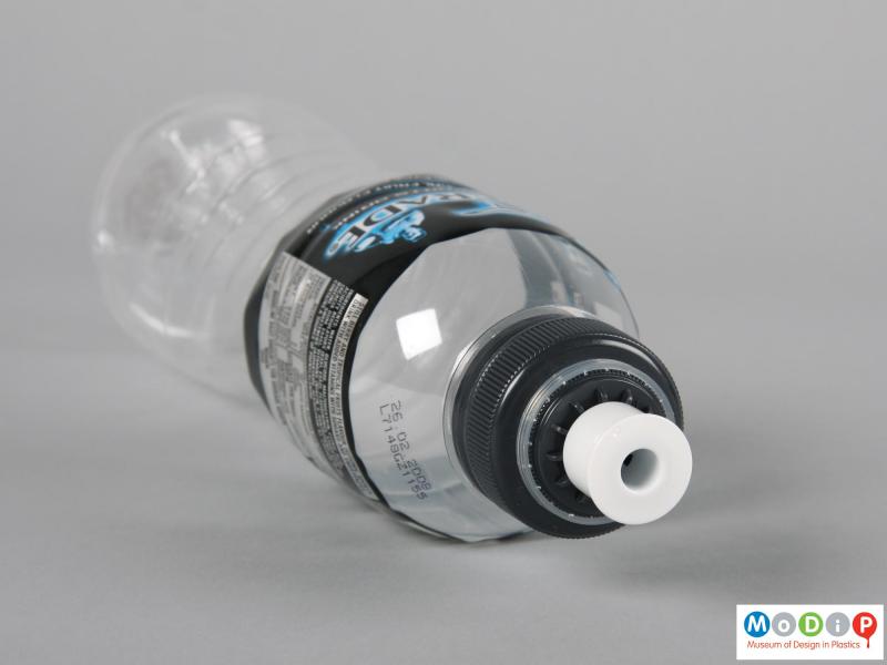Top view of a Powerade bottle showing the dust cap removed.