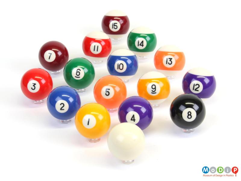 Top view of a set of pool balls showing the glossy surfaces.