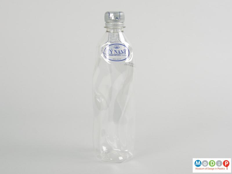 Front view of a bottle showing the contours of the body.