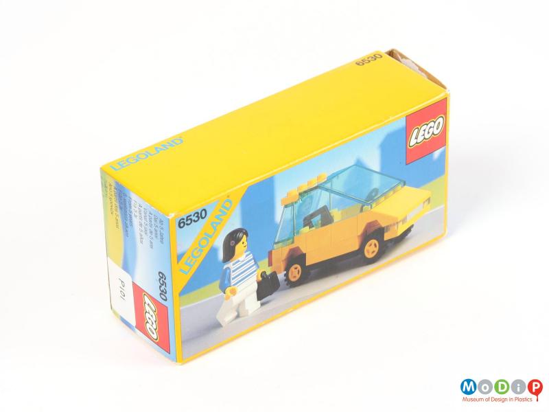 Side view of a toy car showing the packaging.