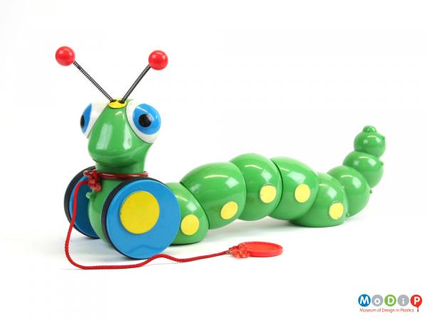 Side view of a pull-along toy showing the sectional body.