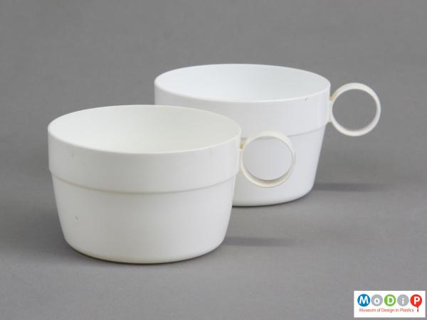 Side view of two cups showing the circular handles.