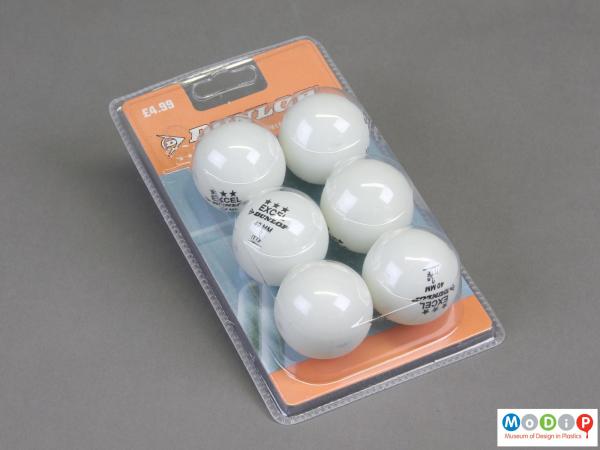 Front view of a set of table tennis balls showing the six balls in their packaging.