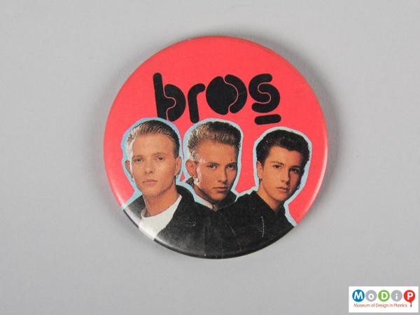 Front view of a pin badge showing the printed image.