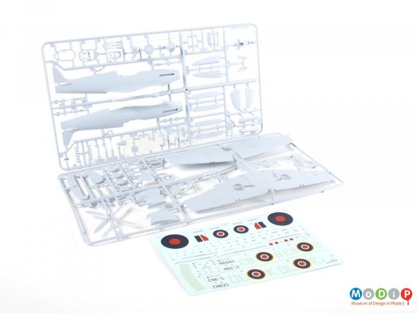 Side view of a model kit showing the panels of injection moulded parts.