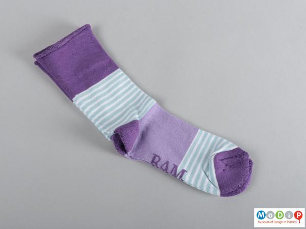 Side view of a pair of socks showing the tube shape.