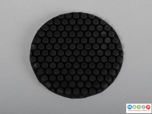 Front view of a protective pad showing the hexagonal pattern.
