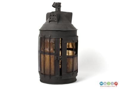 Side view of a lantern showing the closed door.