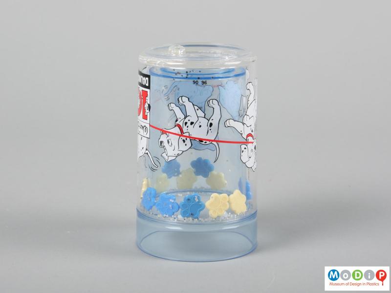 Side view of a beaker showing it upside down to show the movement of the 'glitter'.