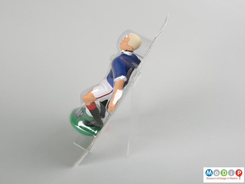 Side view of a Paul Gascoigne figure showing the vacuum formed packaging.