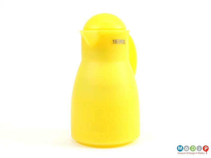 Side view of a Thermos jug showing the smooth lines and dome stopper.