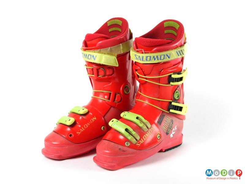 Front view of a pair of ski boots showing the solid structure.