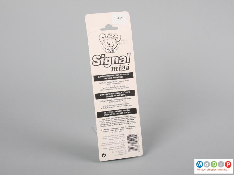 Rear view of a Signal toothbrush showing the back of the packaging.