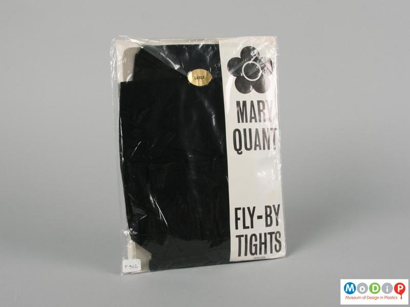 Rear view of a packet of tight showing the tights through the packet.
