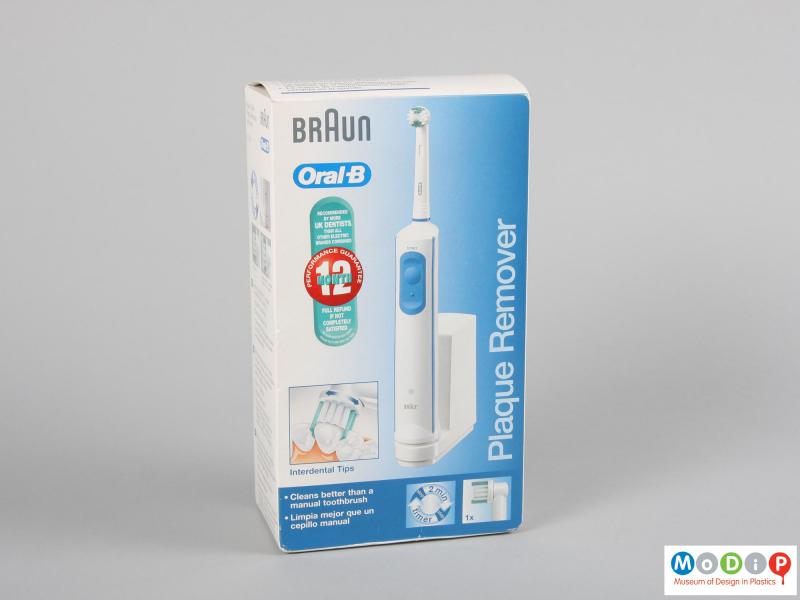 Front view of an electric toothbrush showing the packaging.