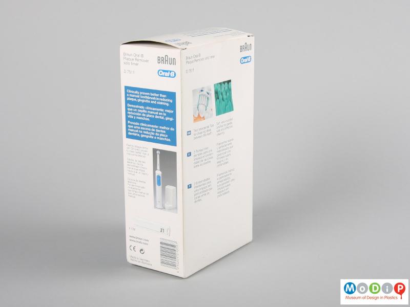 Rear view of an electric toothbrush showing the packaging.