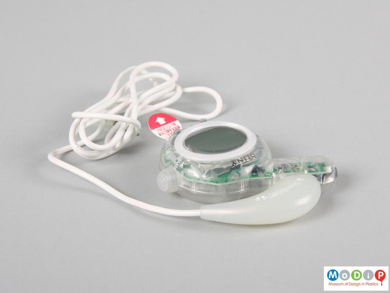 Side view of a Sony Funbbit showing the white cable and clear body.