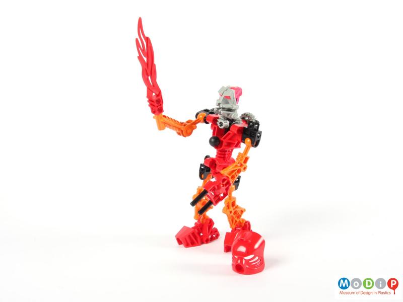 Front view of a Lego set showing the unmasked face and ball joints.