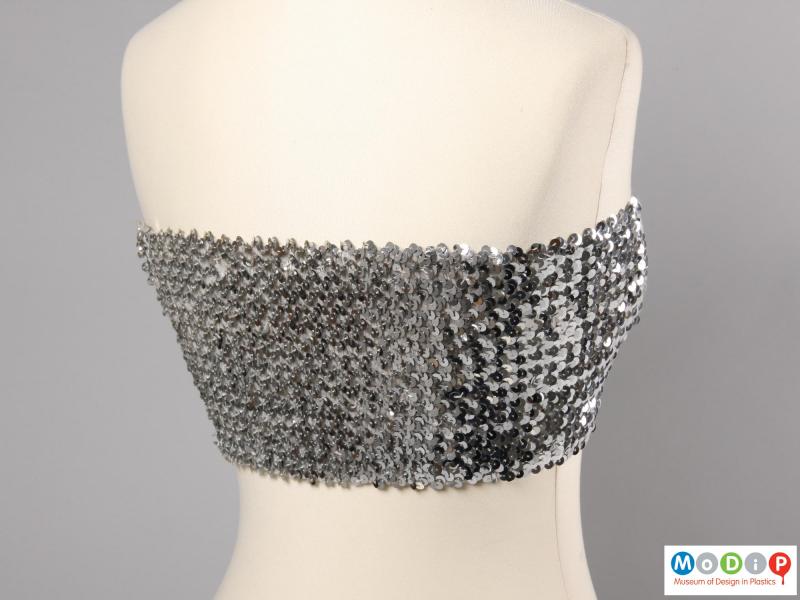 Side view of a boob tube showing the rows of sequins.