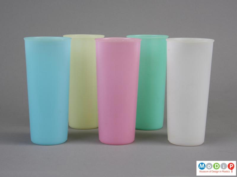 Side view of a group of 5 beakers showing the tall slender shape.