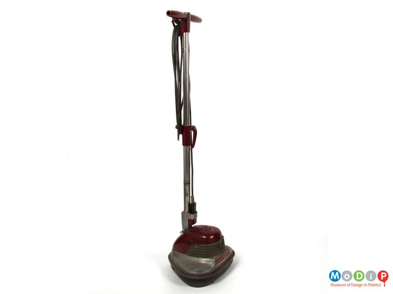 Side view of an Electrolux floor polisher showing ther shape of the base.