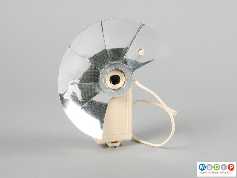 Front view of a flash unit showing the fan opening up.