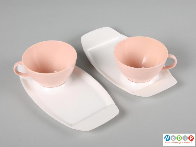 Top  view of a Silvant cups and trays set showing the plain surface of the trays and the smooth inside of the cups.