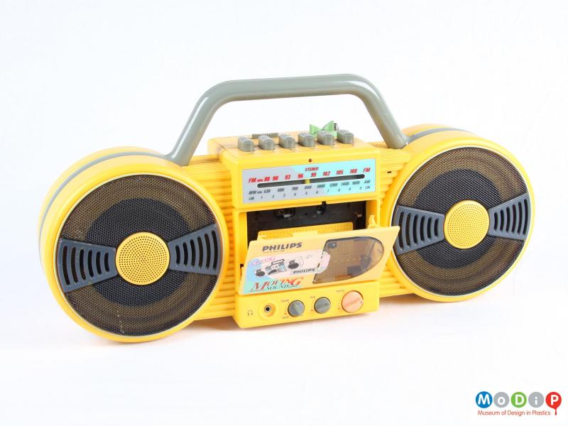 Front view of a cassette player showing the open casette deck.