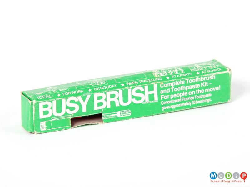 Side view of a Busy Brush showing the packaging.