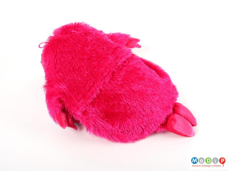 Rear view of a hot water bottle cover showing the fuzzy body.
