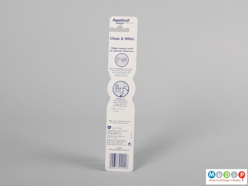 Rear view of a toothbrush showing the packaging.