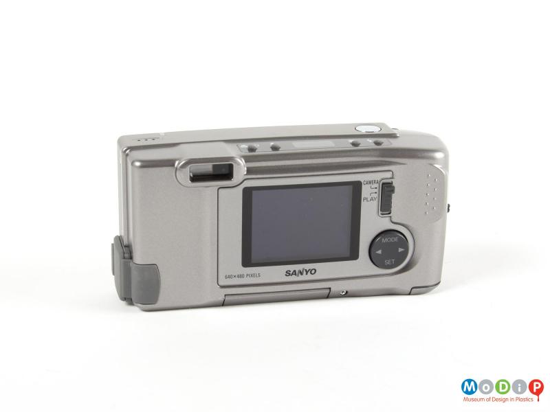 Rear view of a digital camera showing the view finder, screen, and controls.