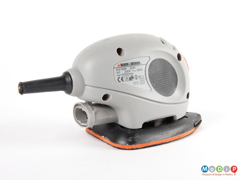 Side view of a Black and Decker Mouse showing the safety information plate.