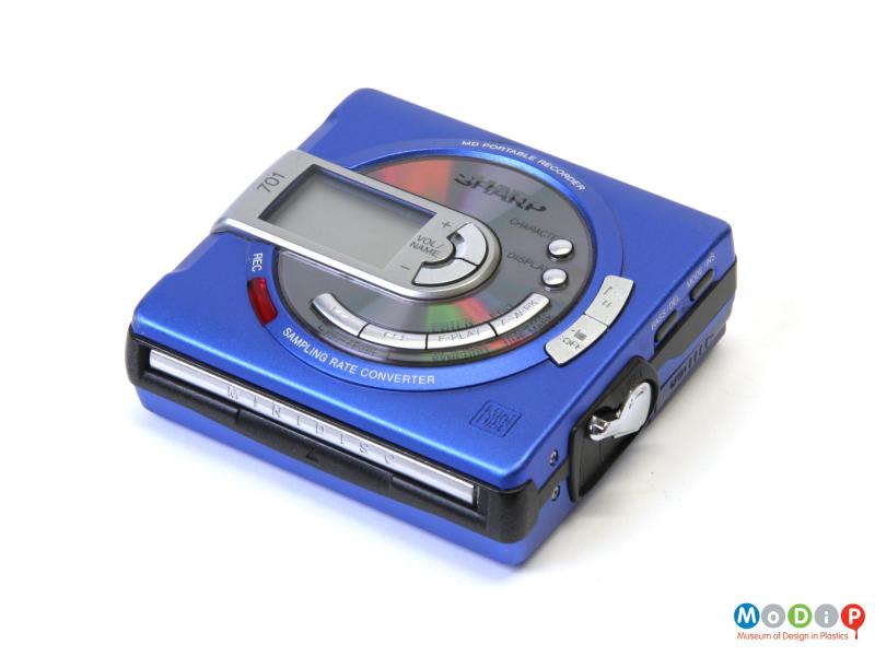 Side view of a MiniDisc player showing the control buttons on the front.