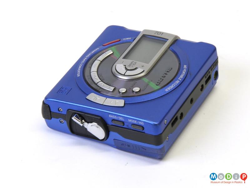 Side view of a MiniDisc player showing the control buttons on the side.