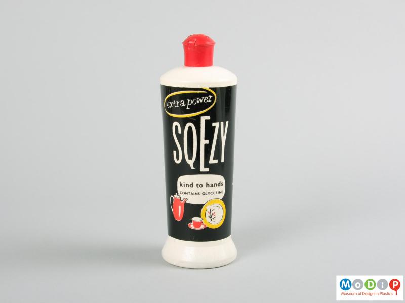 Front view of a Sqezy bottle showing the printed surface.